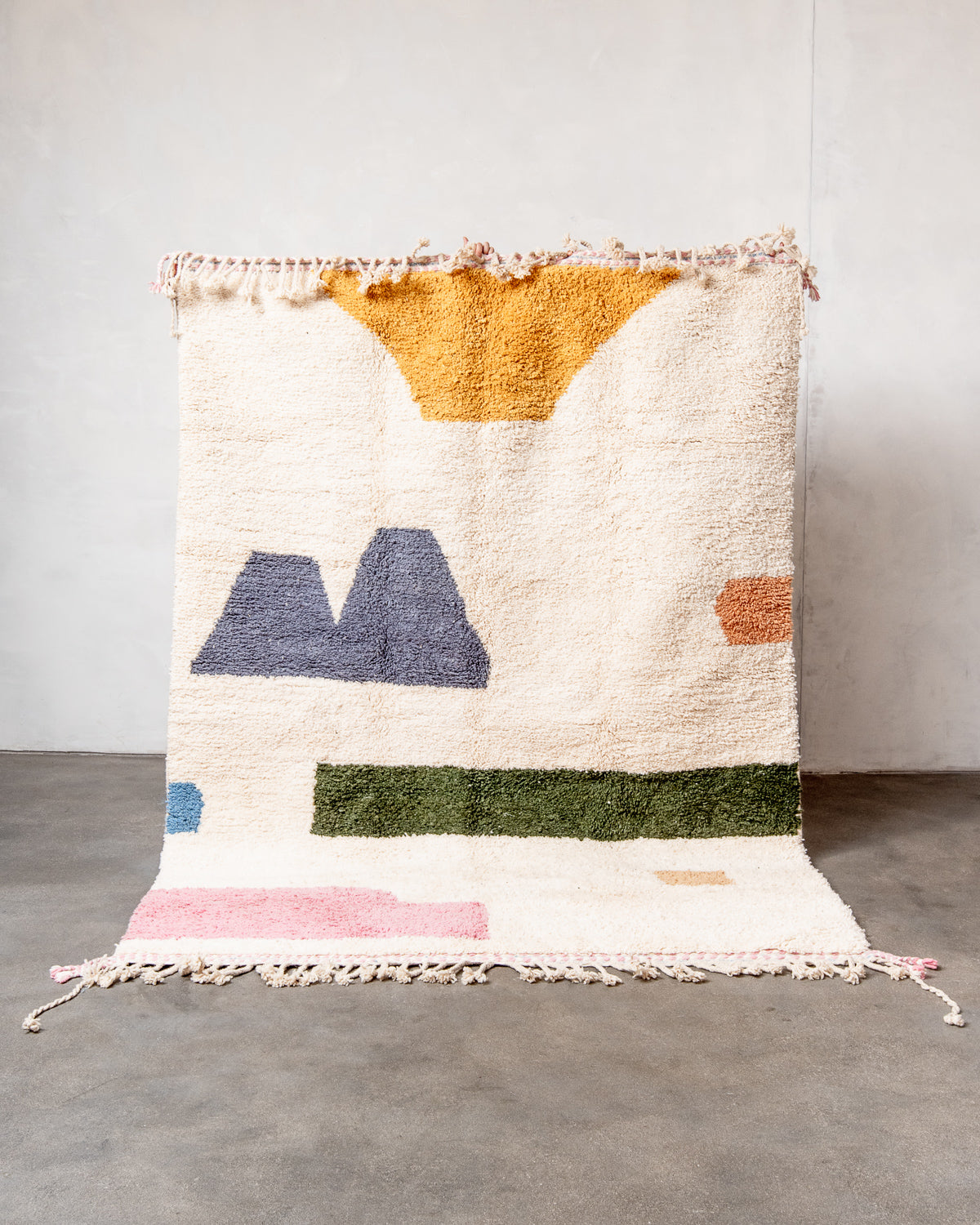 Modern, designer, handcrafted Berber rug from Morocco. Beniourain carpet with beautiful colours and patterns and fluffy wool texture.